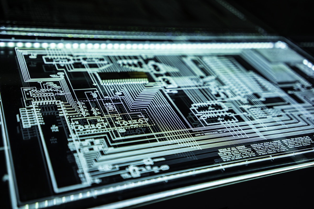 Abstract digital circuit board with glowing nodes representing AI-powered security analysis